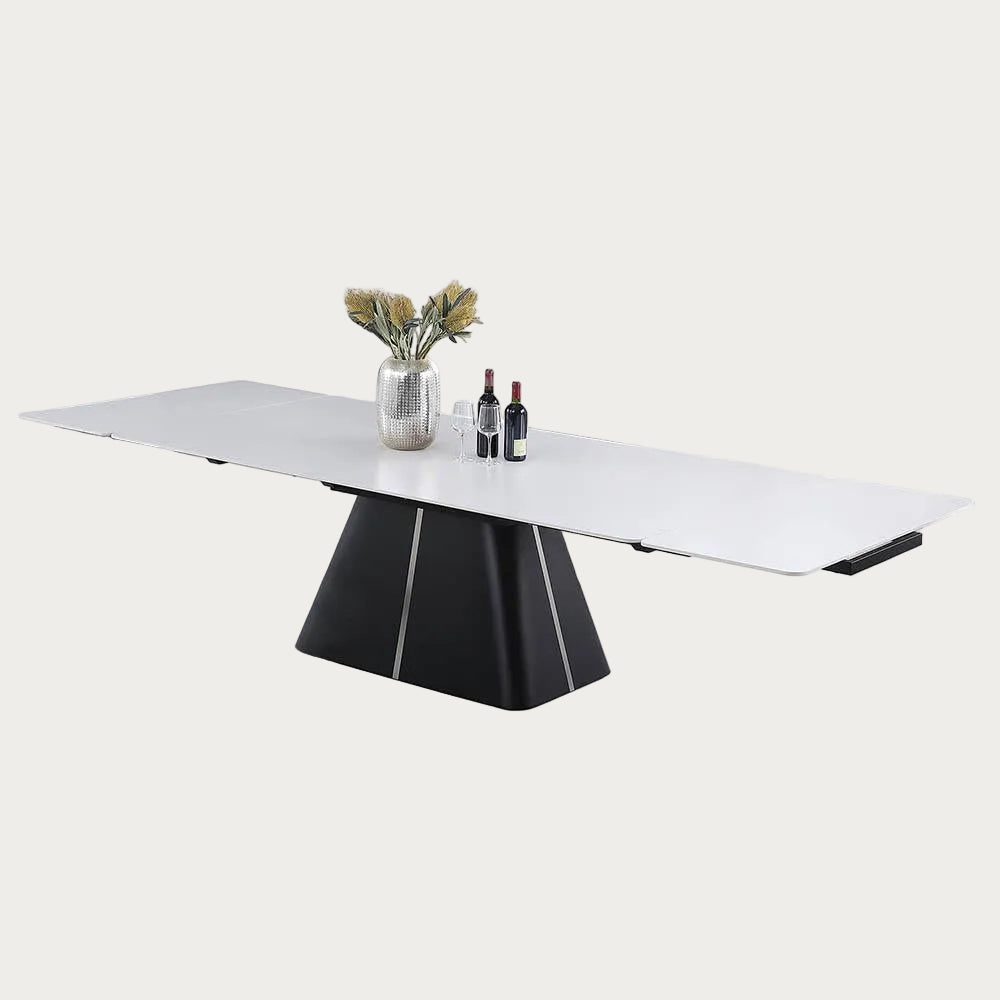 Mabel modern dining table with a white top and black base on a white background