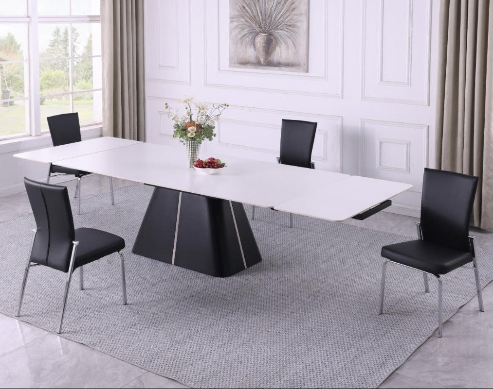 Mabel modern dining table with black chairs in a bright room