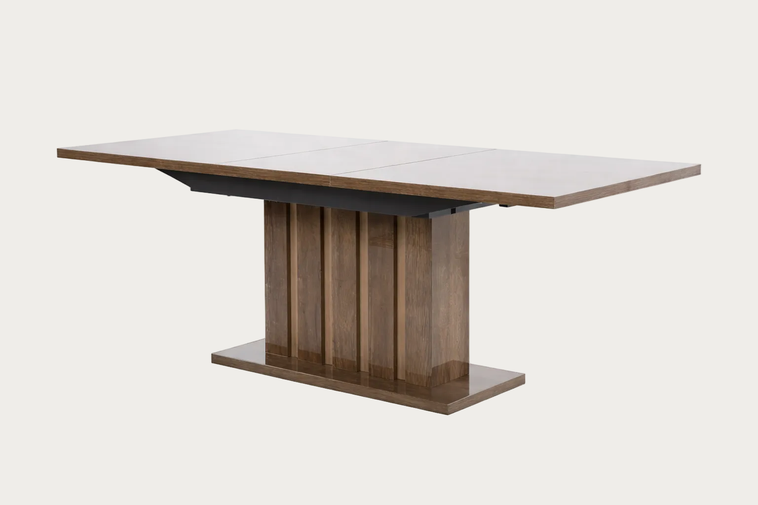 Matera dining table with wooden base and extendable top.