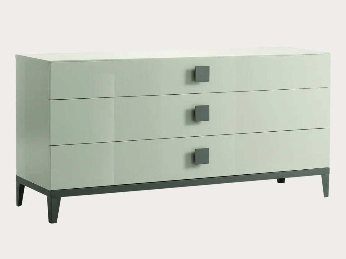 Mont Blanc white dresser with three drawers and gray legs on a white background