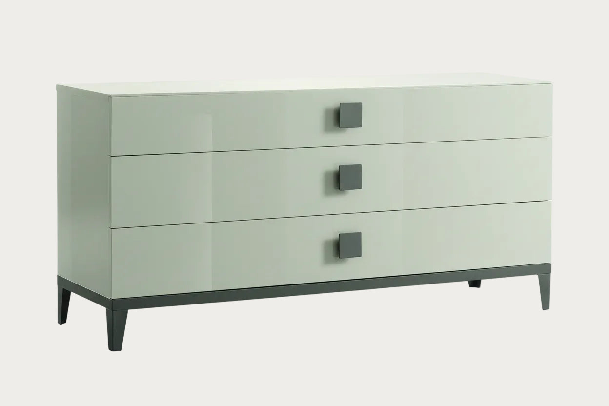 Mont Blanc white dresser with three drawers and gray legs on a white background