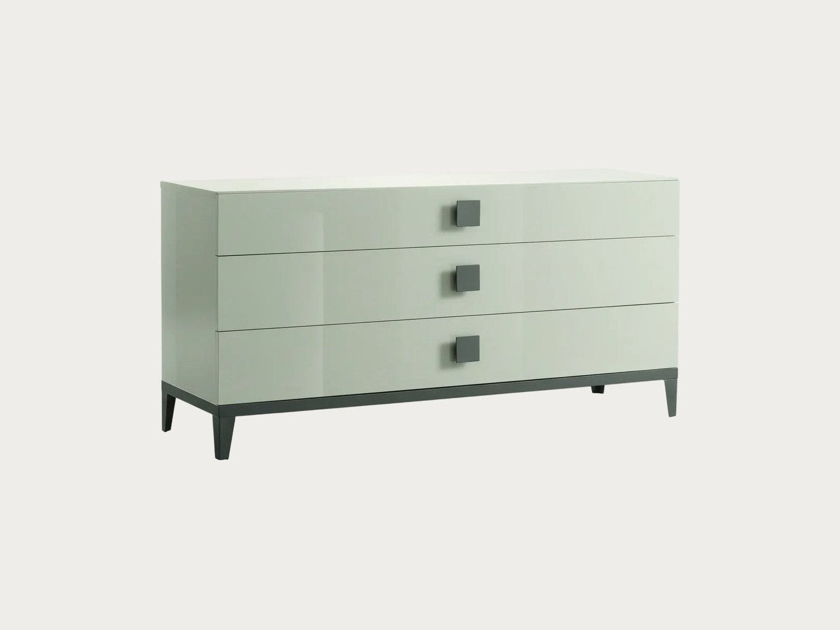 Mont Blanc white dresser with three drawers and gray legs on a white background