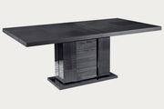 Montecarlo dark gray dining table with a modern design on a white background.