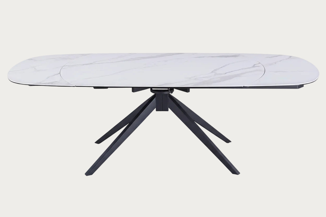 Nicole white oval table with black metal legs on a white background