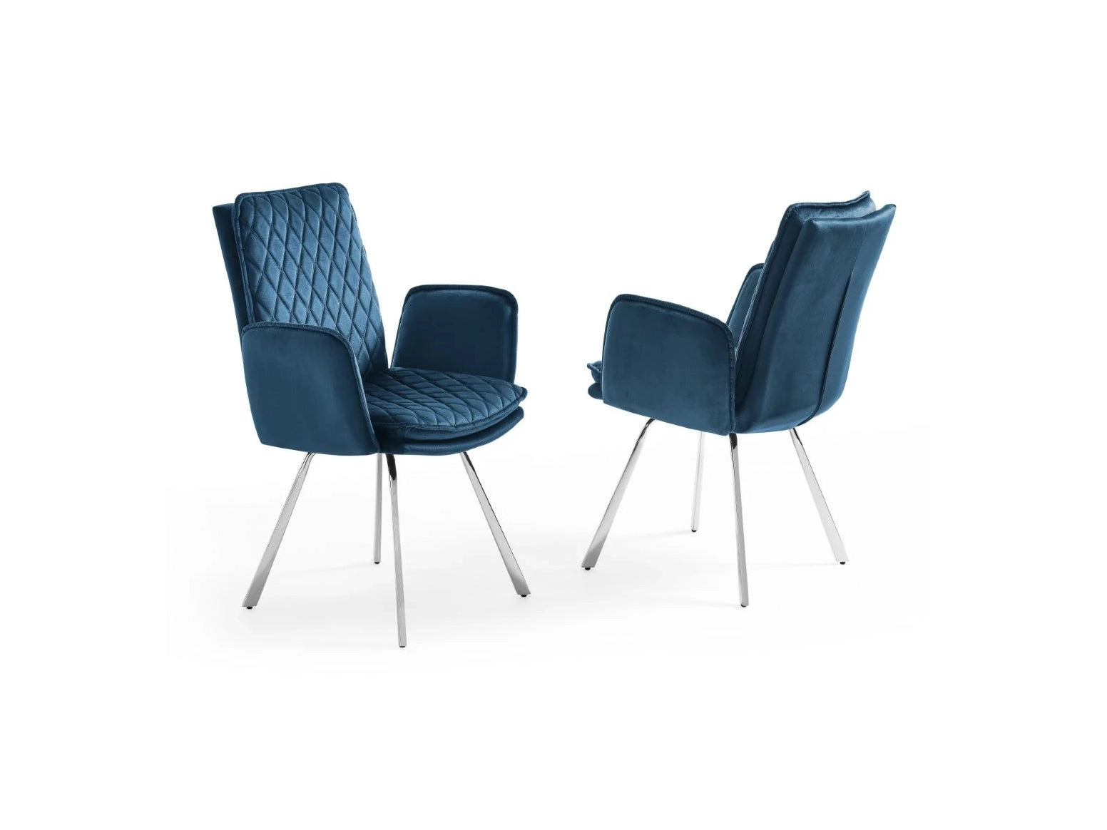 Two modern navy blue velvet armchairs with quilted upholstery and polished chrome legs sit against a white background.