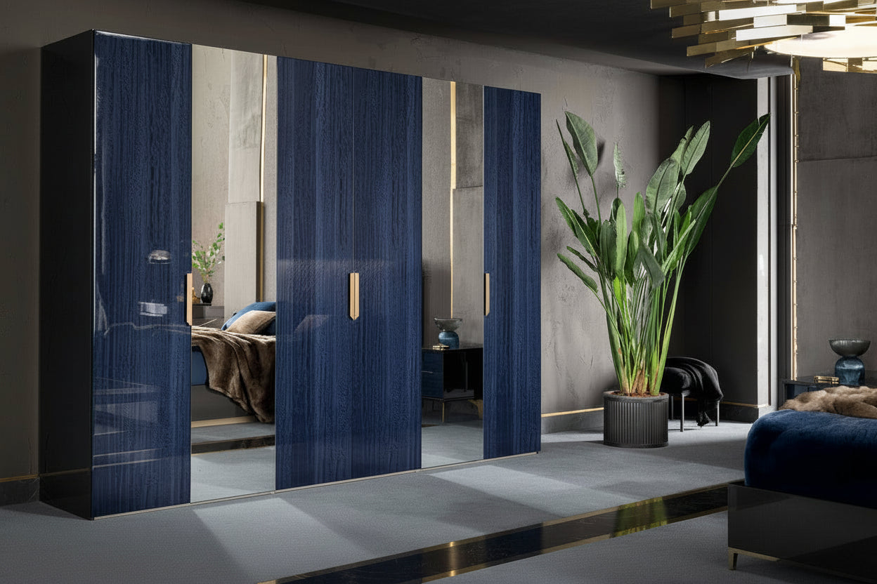 Modern interior with Oceanum blue wardrobe doors and a plant in a stylish room.