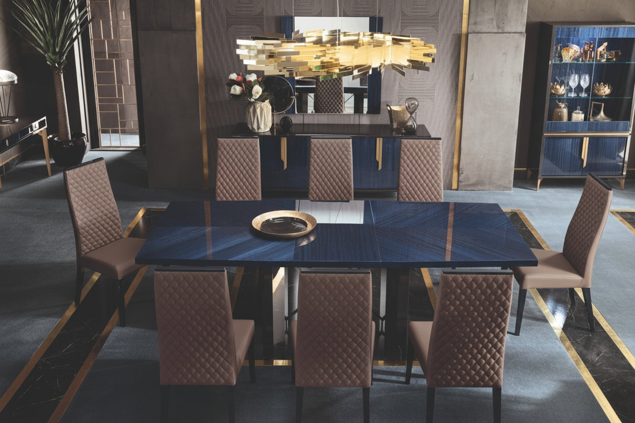 Oceanum modern dining room with a large dark blue table and chairs in a stylish interior.