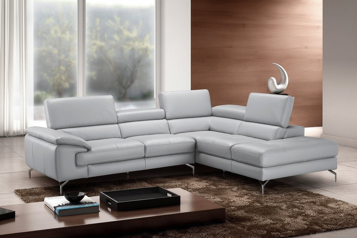 Olivia Gray sectional sofa in a modern living room with a wooden coffee table and decorative items.