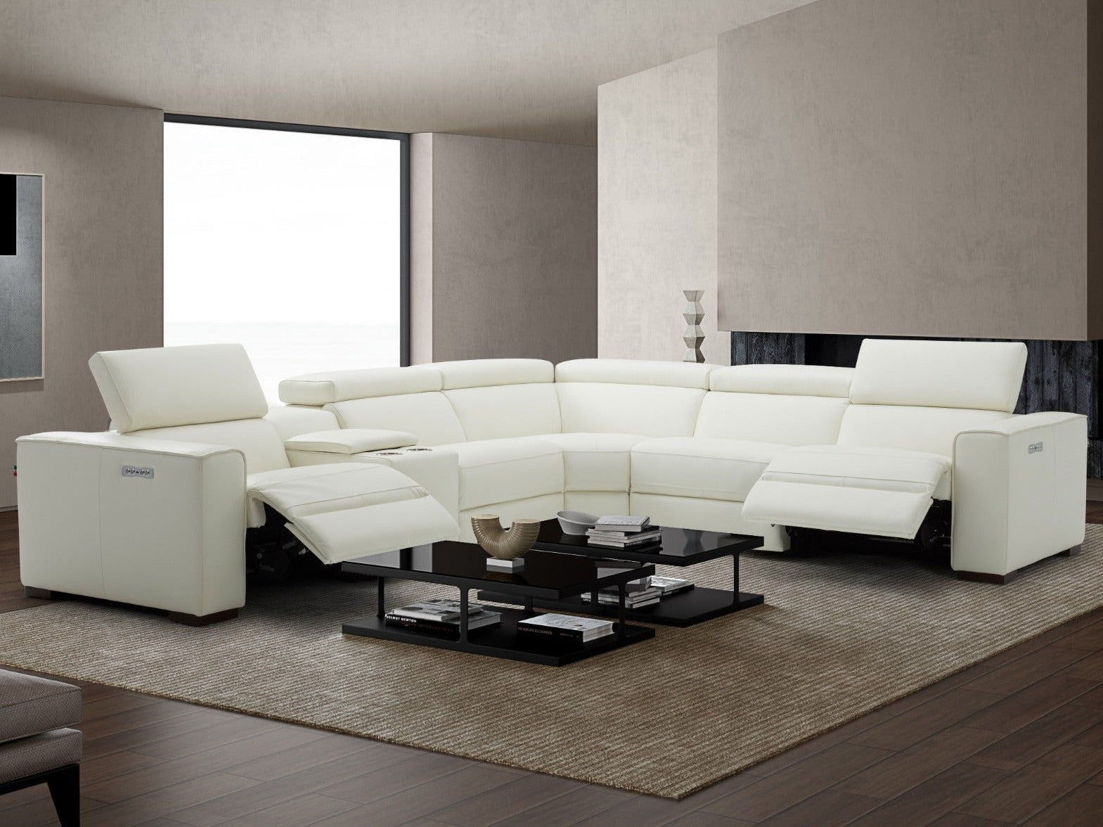 Modern white sectional sofa in a living room setting with a coffee table.