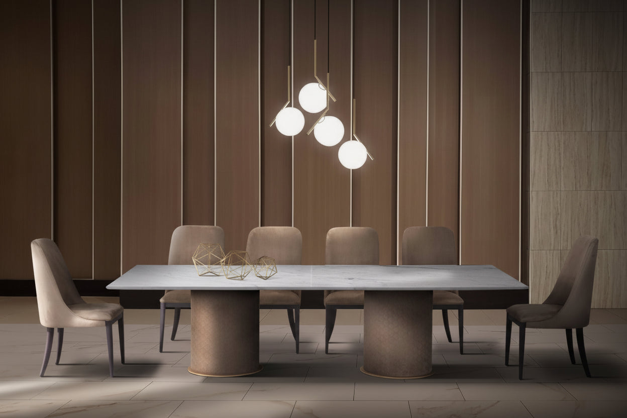 Modern dining room with a long table and chairs under a pendant light fixture.