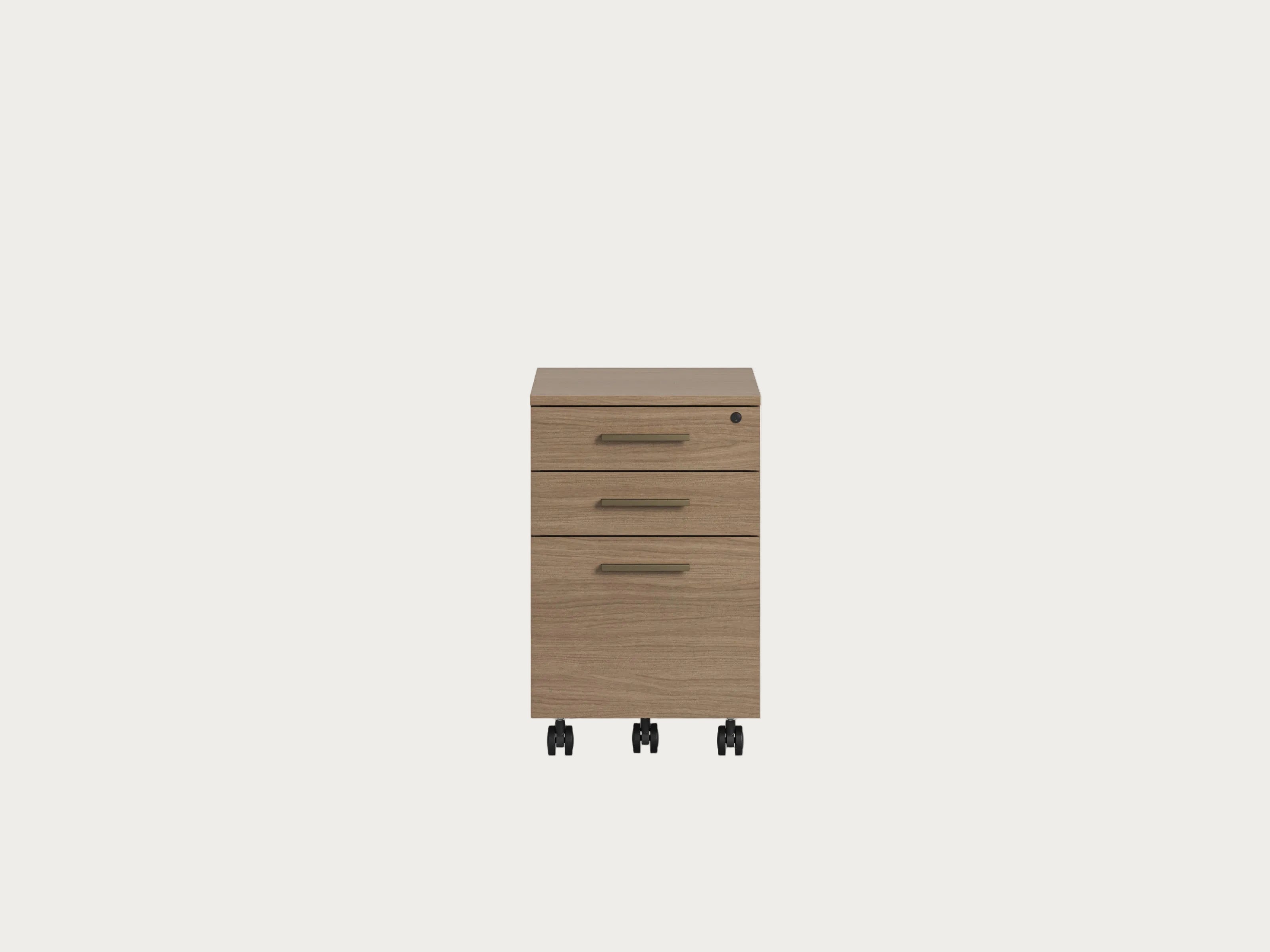 BDI Sequel Studio Mobile Pedestal with three drawers on wheels against a white background