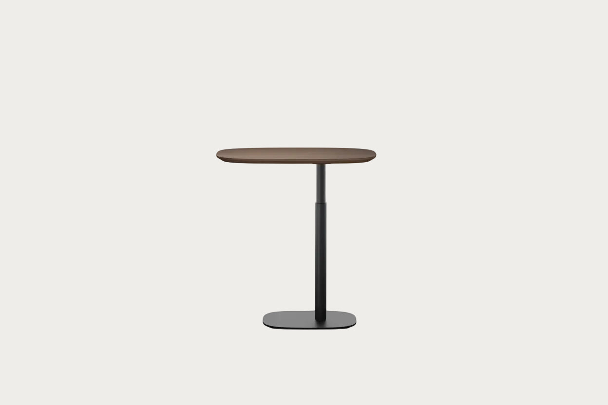 BDI Serif lift laptop table with a dark brown top and black legs on a white background.