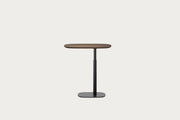 BDI Serif lift laptop table with a dark brown top and black legs on a white background.