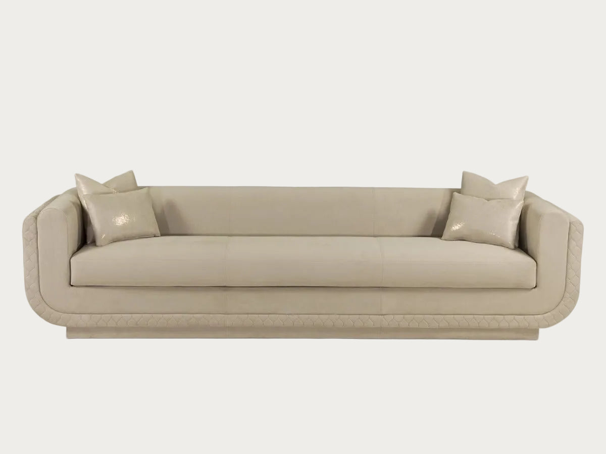 The Sophie beige sofa with cushions on a white background.