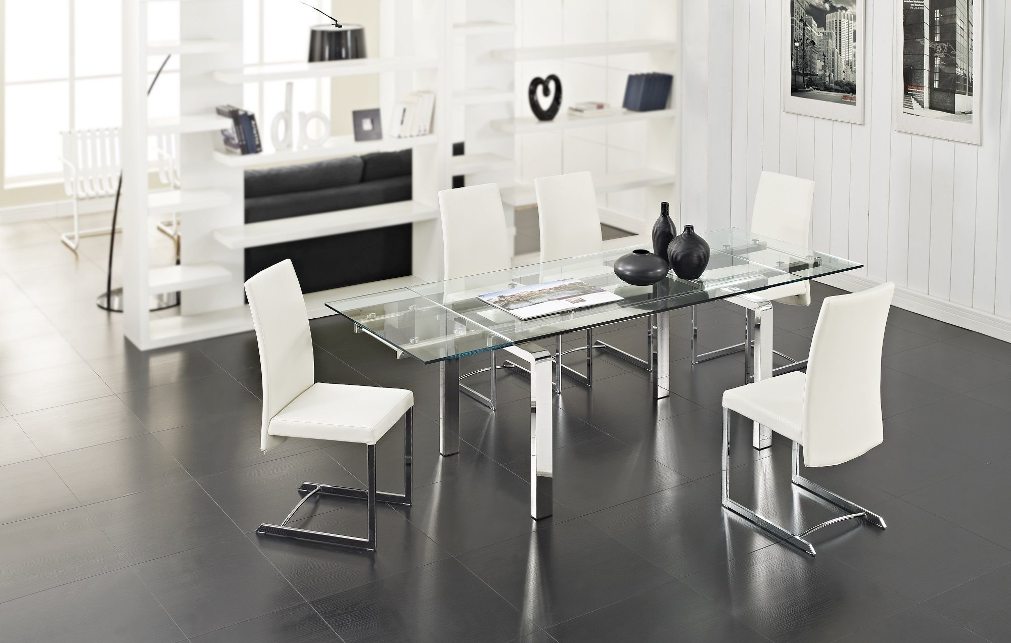 Stark dining room set with white chairs in a minimalistic room.