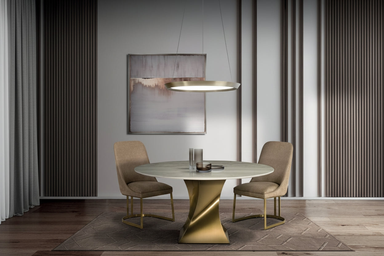 Twist round dining table with chairs, featuring a gold base and marble top.